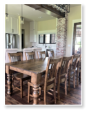 Custom built dining table in the Classic Farmhouse style built by Cattle Bend Woodworks.